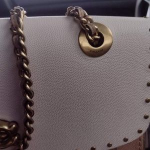 Couch purse the price for it new is 450 i am asking 250